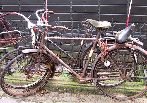Rusty old bikes -- still locked up<br>Netherlands, Bicycles ; 2000